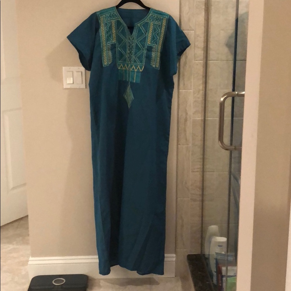 Beautiful green caftan.